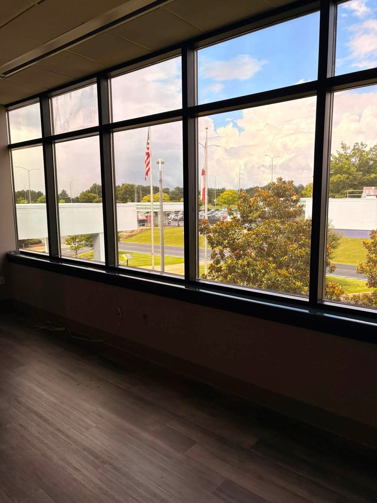 Commercial facility interior with clean floor-to-ceiling glass